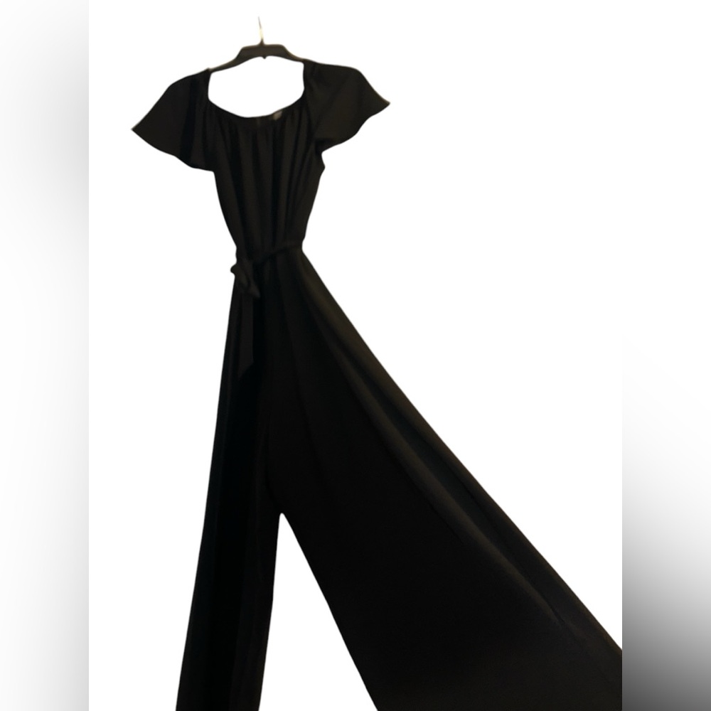 DKNY Women’s Jumper in the color black in a size US 14 . Made by DKNY